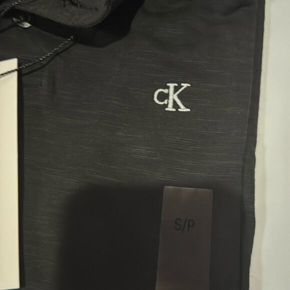 NWT Calvin Klein Jeans Black With White Logo Polo Shirt Size Small - Picture 3 of 5